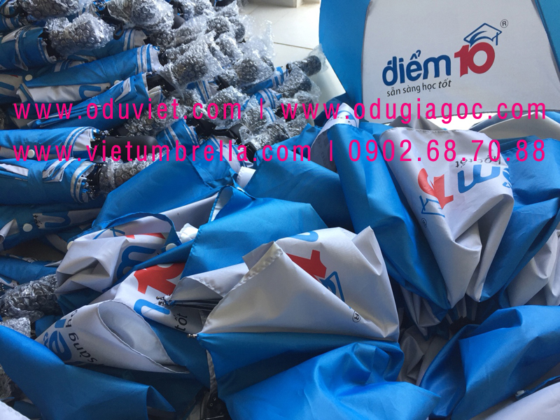 xưởng sản xuất ô dù cầm tay in logo quảng cáo